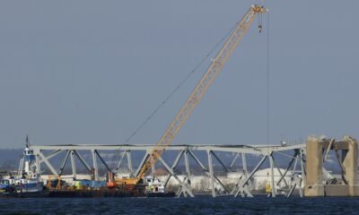 At collapsed Baltimore bridge, focus shifts to the weighty job of removing the massive structure